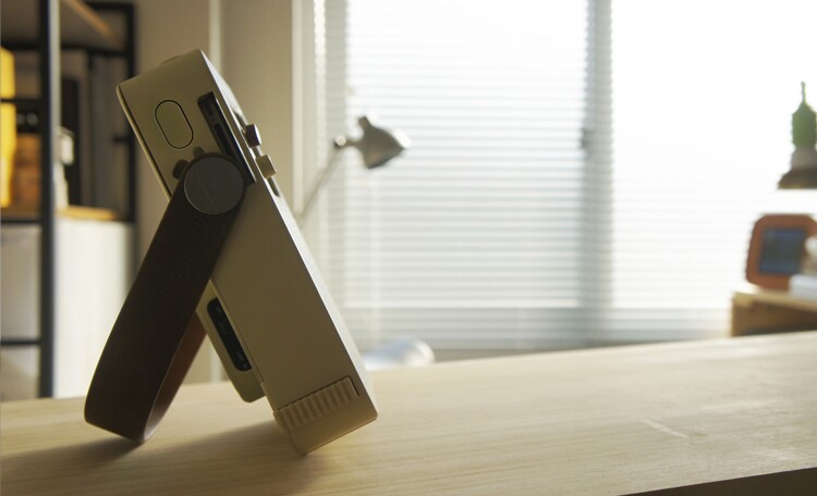 The speaker's handle also features a tilt-lock mechanism that enables it to be tilted to different angles