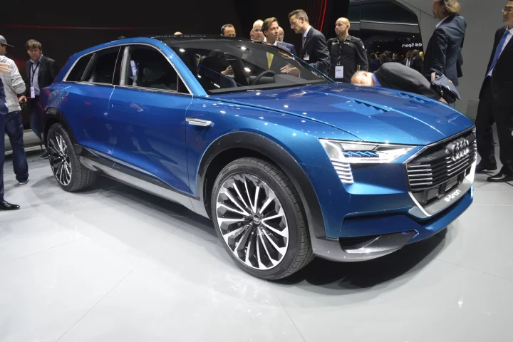 Audi's e-tron quattro packs three electric motors into that shapely body