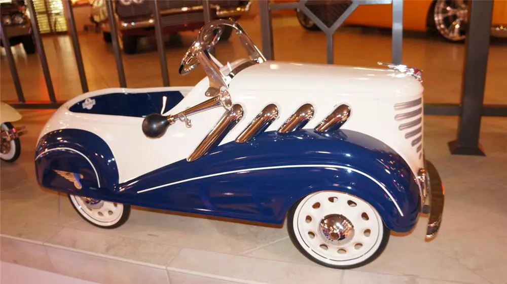 This 1935 "Supercharged" Auburn pedal car by Steelcraft was restored to show quality standards and sold for $17,250 as part of Barrett-Jackson's sale of the Pratte Collection.