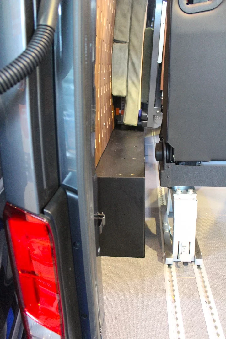 The Mountain 4x4 show van includes floor rails and steel wheel well covers with mounting holes