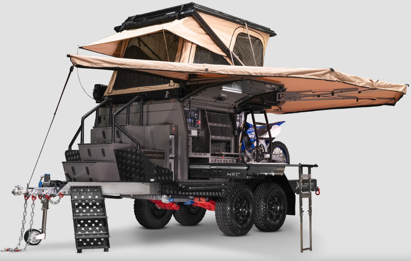 The HKC Xplorer Toy Hauler offers 2,645 lb of payload and is specced to carry three dirt bikes or a single four-wheel ATV