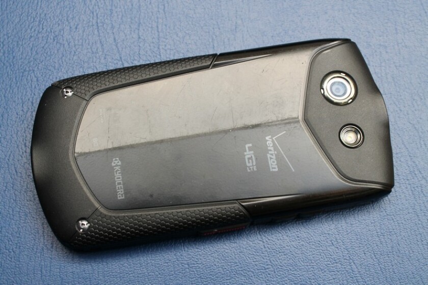 The sapphire screen remains pristine, but the rear panel reveals weaks of rough treatment