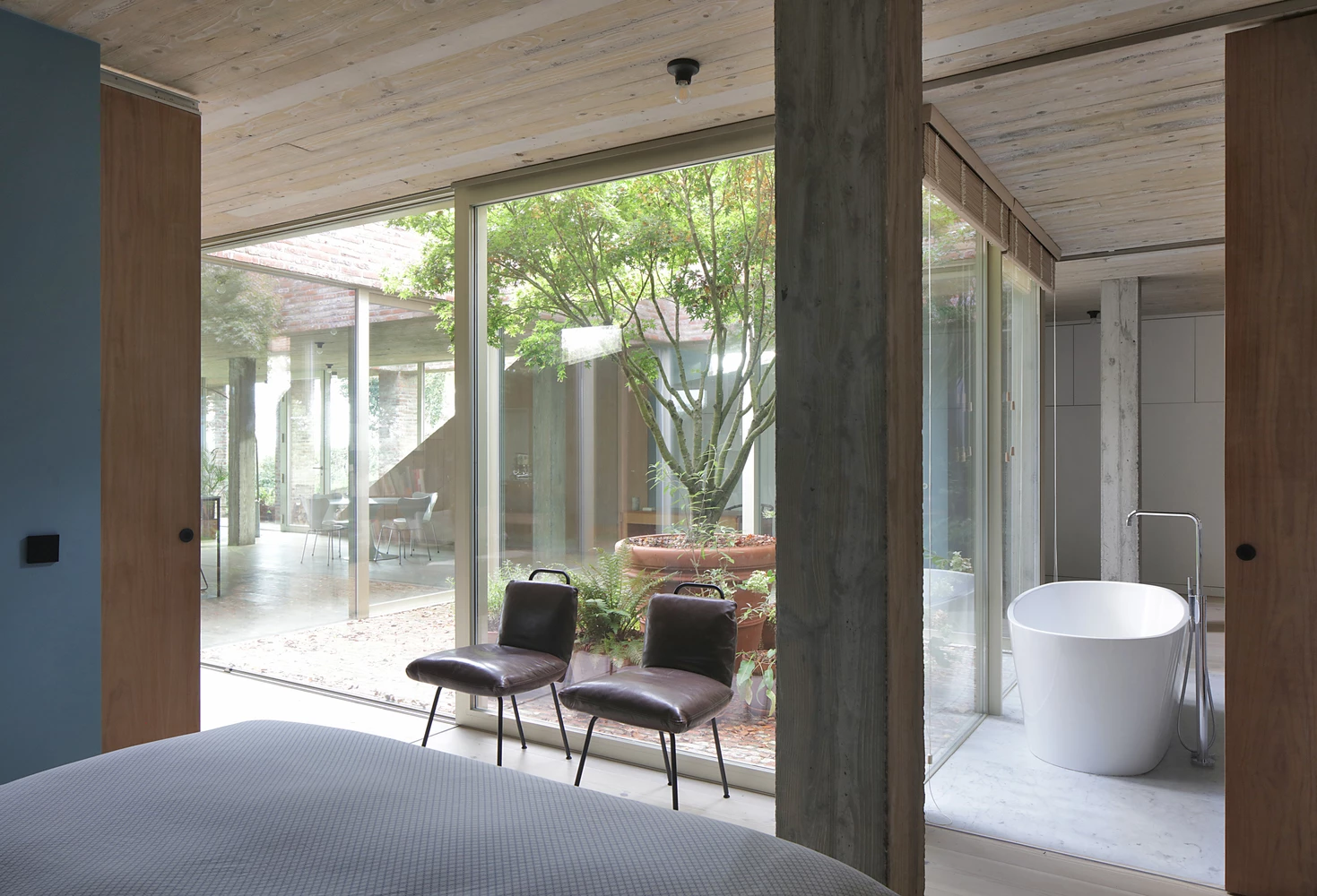 The master bedroom looks out onto the internal garden