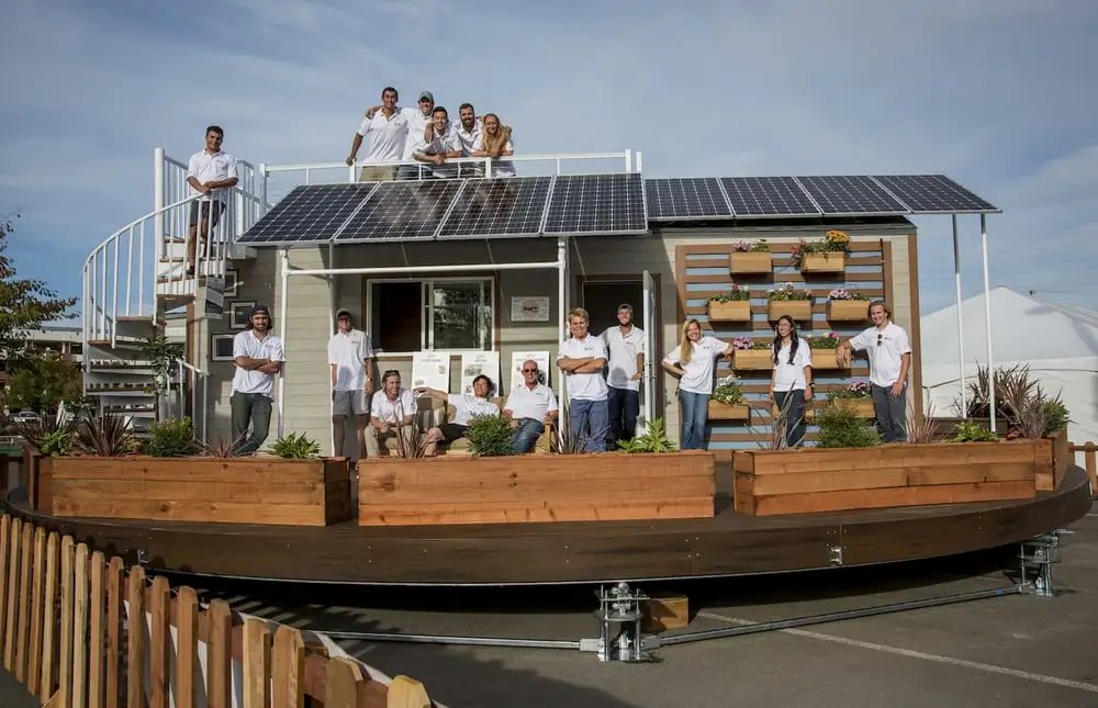 The Revolve House sits on a trailer atop a sun tracking ring that rotates it to catch the maximum rays