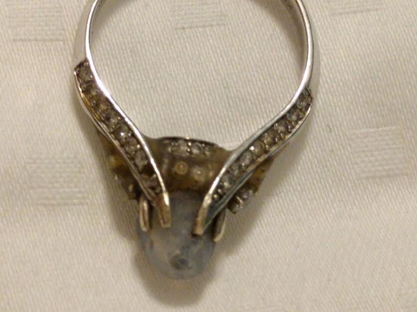 Luke Workman's unique wedding ring: glows in the dark due to weird surface chemistry interactions between the 92 different elements he's mixed up and built into it