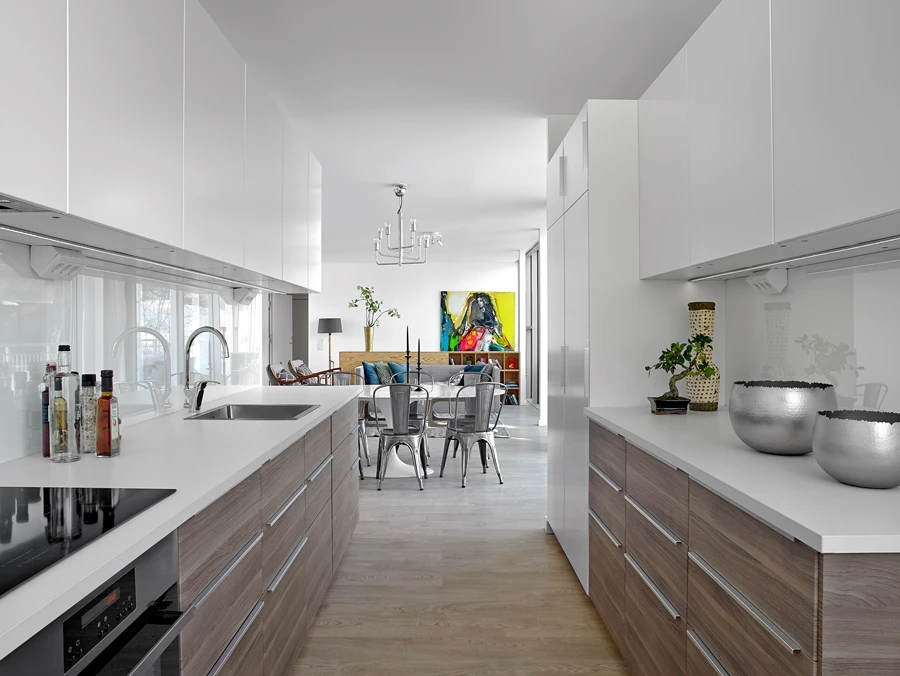 The kitchen area is adjacent to the living room area