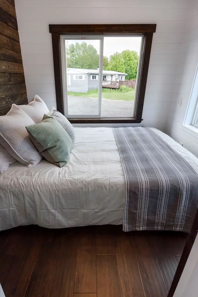 The Canada Goose's main bedroom is located in the gooseneck (raised) area of the trailer