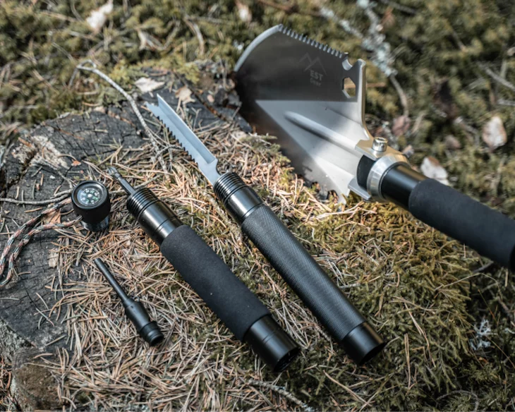 The EST Shovel features a further 17 tools, including knife, spear, bottle opener, fire starter, and wire-cutter