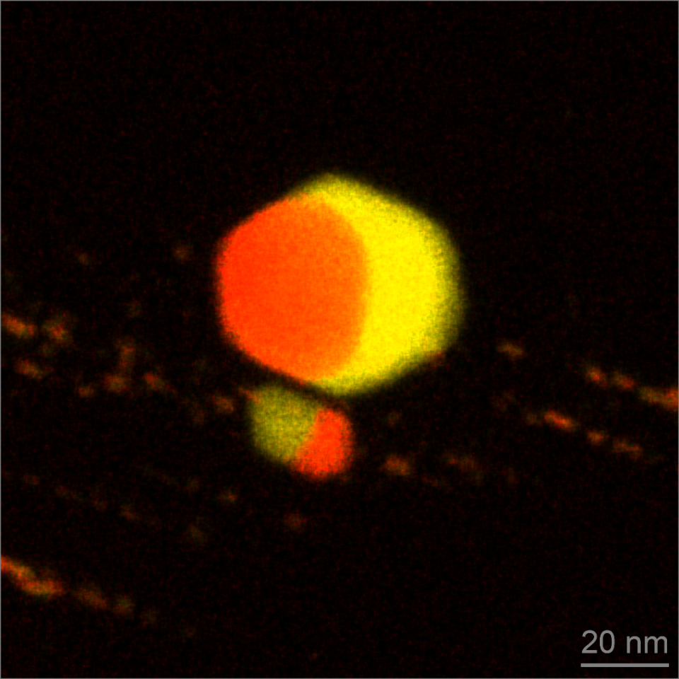 A chemical map showing iron (yellow) and sulfur (red) impurities inside the diamonds