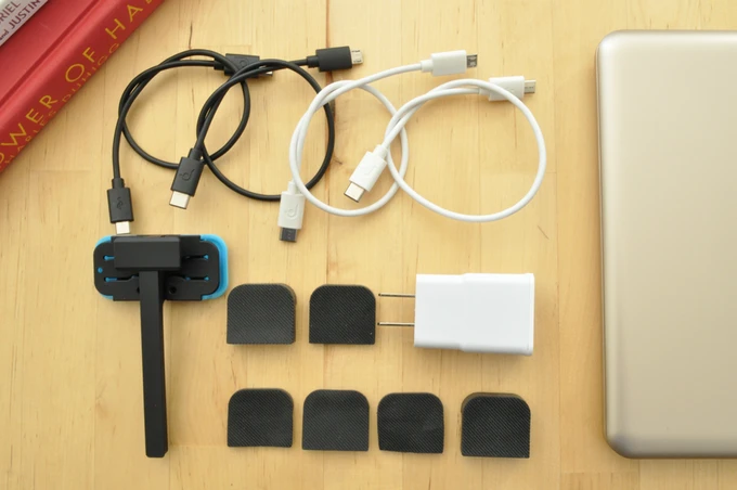 The smartphone adapter lets you attach your phone to the side of the laptop