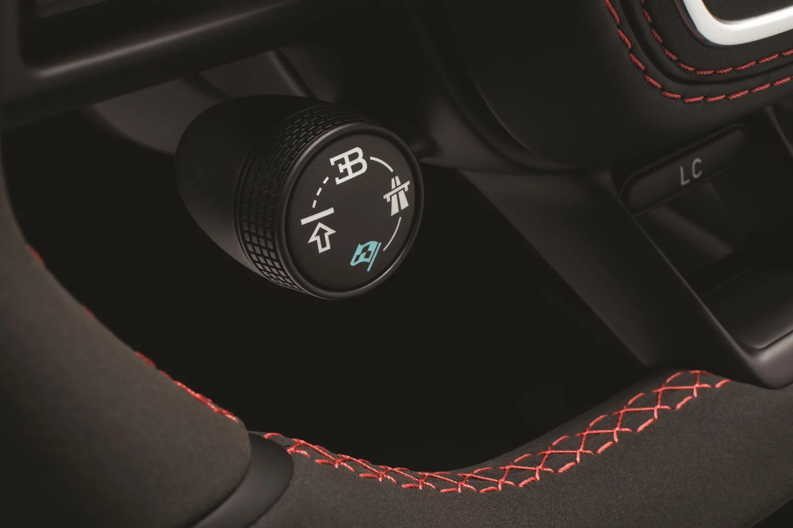 Driving modes are selected through this button on the Bugatti Chiron's steering wheel