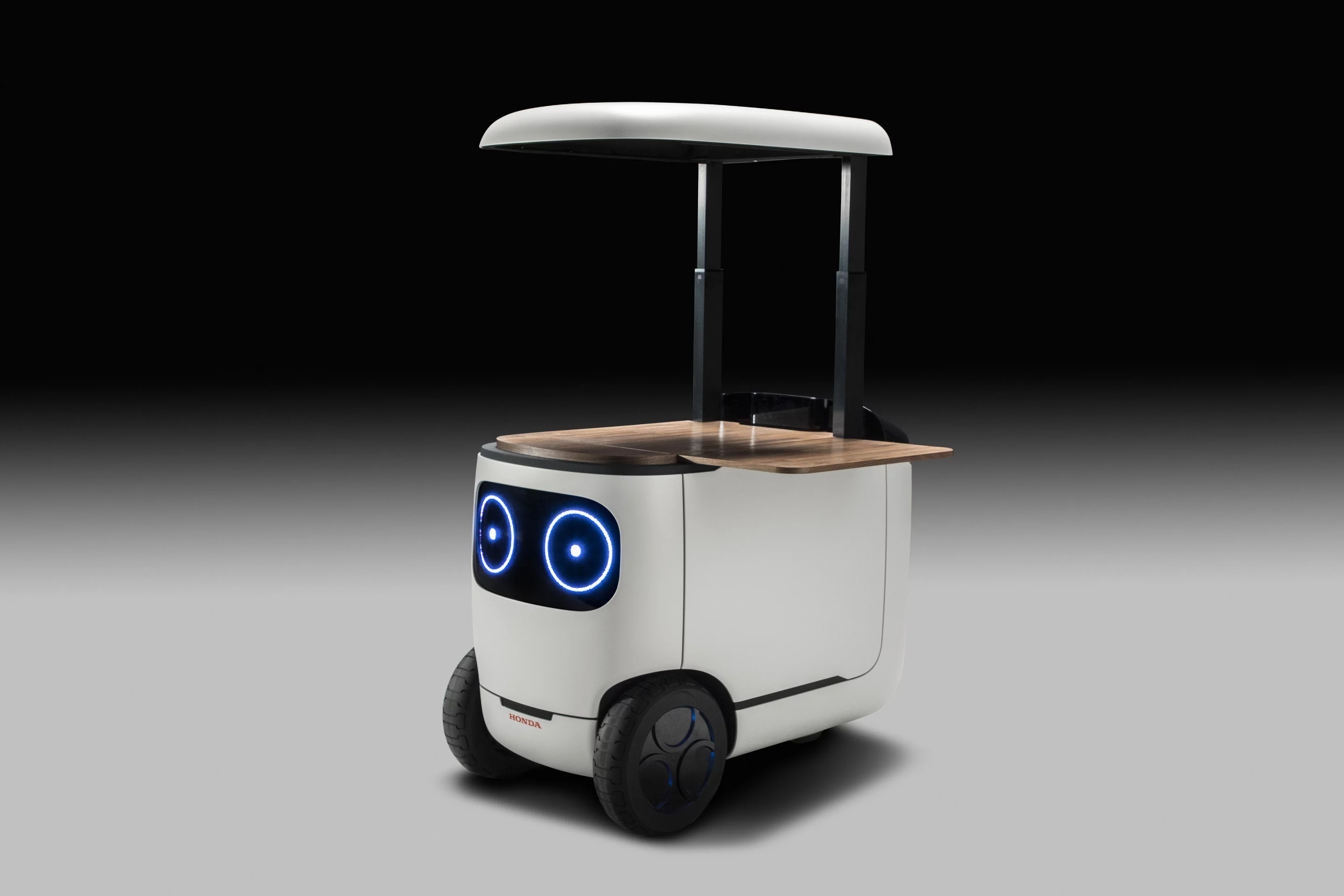 Honda's 3E-C18 concept's upper surface rises to form a canopy, with various add-ons able to be attached for commercial and personal use