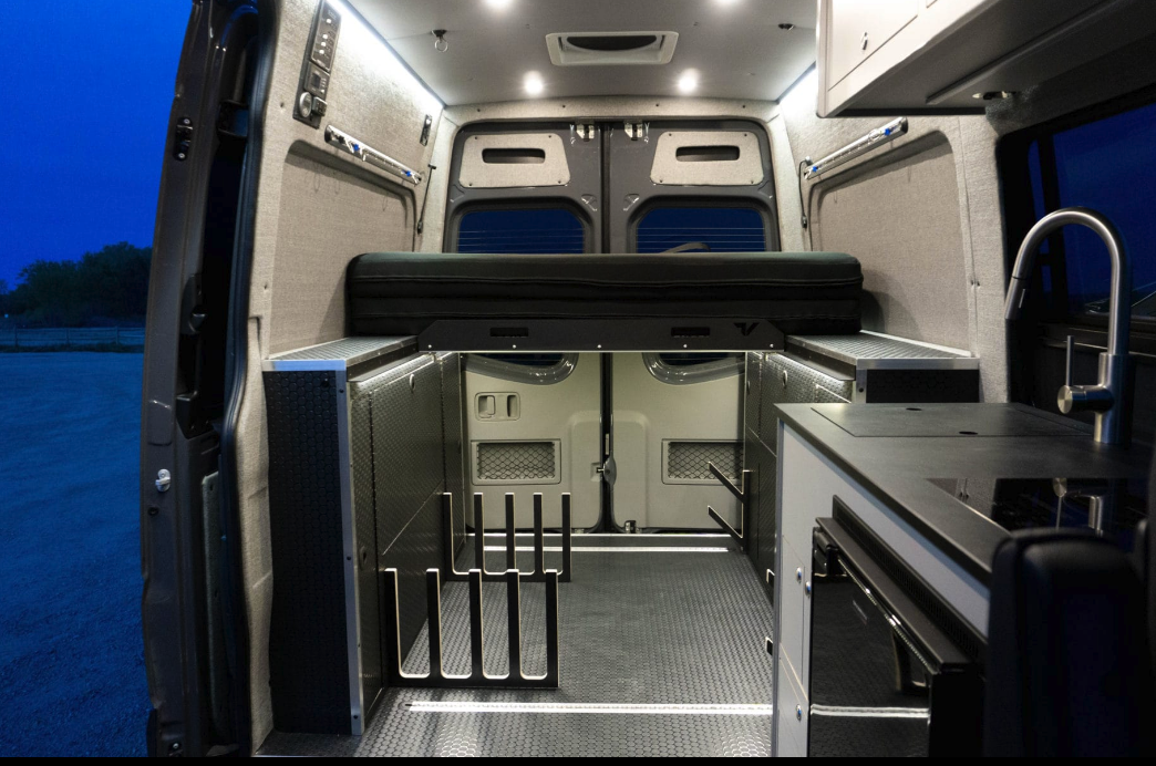 A foundational element of the Titan Classic and Skier/Surfer vans, the Bi-Slide bed slides in half when not in use, opening up extra storage/living space