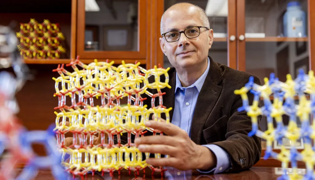 Study lead Omar Yaghi with molecular models of metal-organic frameworks, which predate his COFs