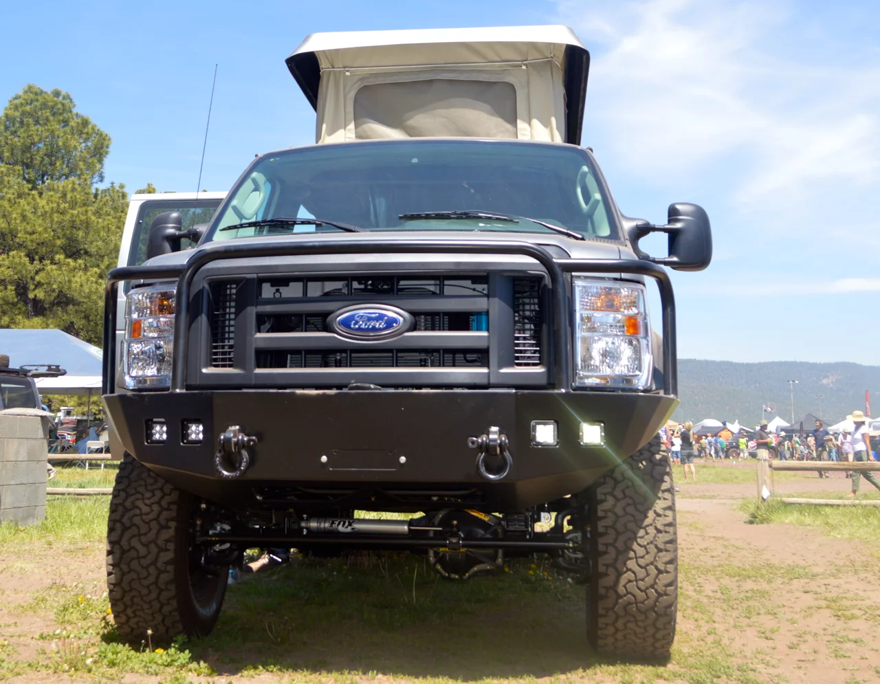 This Sportsmobile's fiberglass camper offers a wider interior (up to 74 in/188 cm)