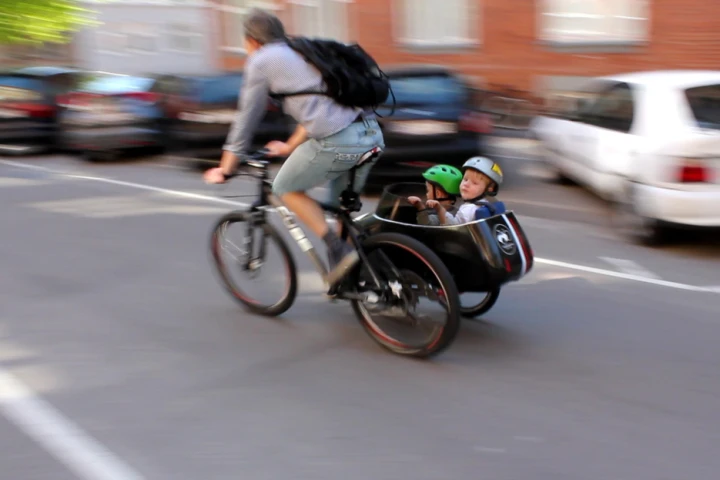 The sidecar can hold two small children