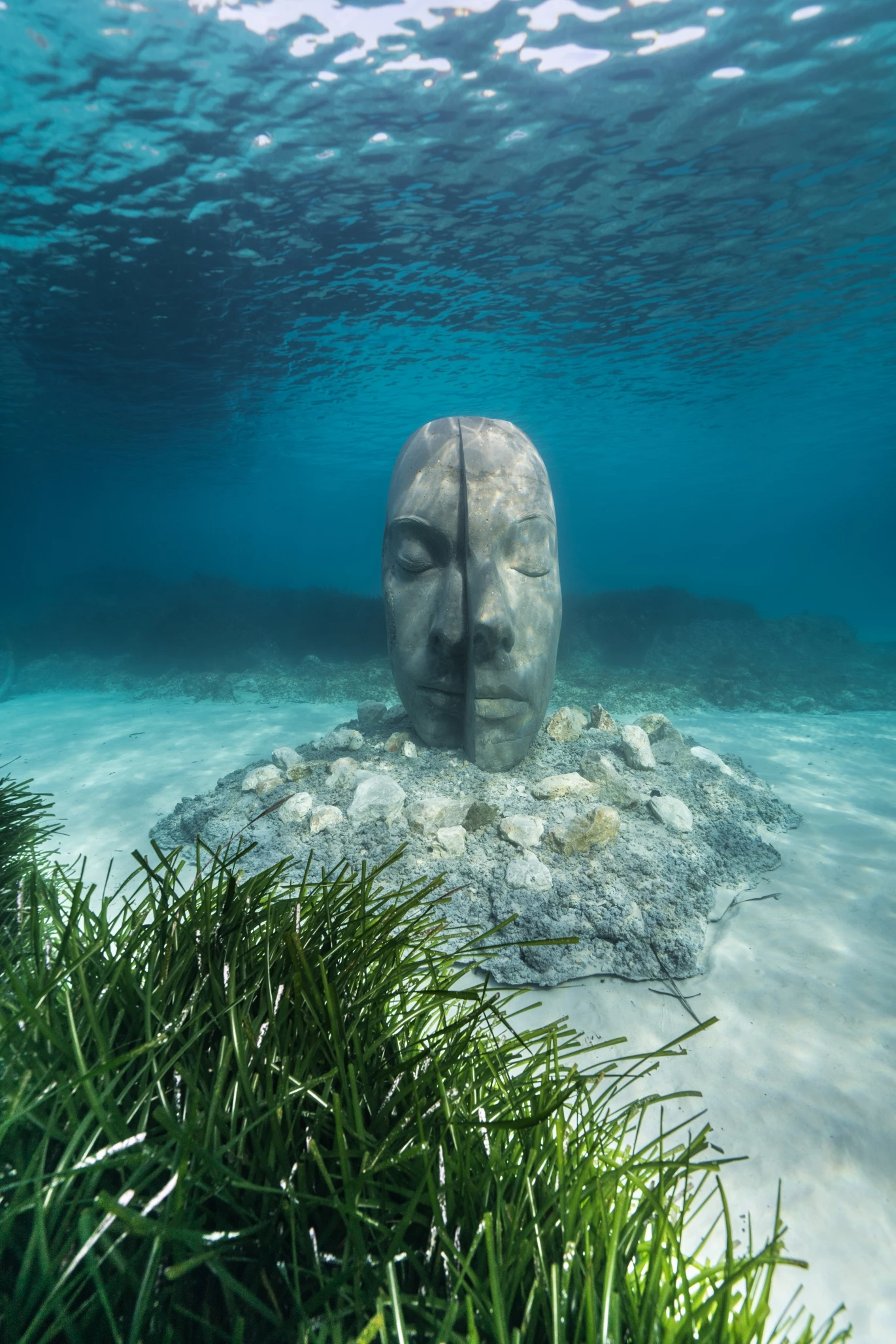 The sculptures in the Cannes Underwater Museum are situated on the sea bed and surrounded by seagrass