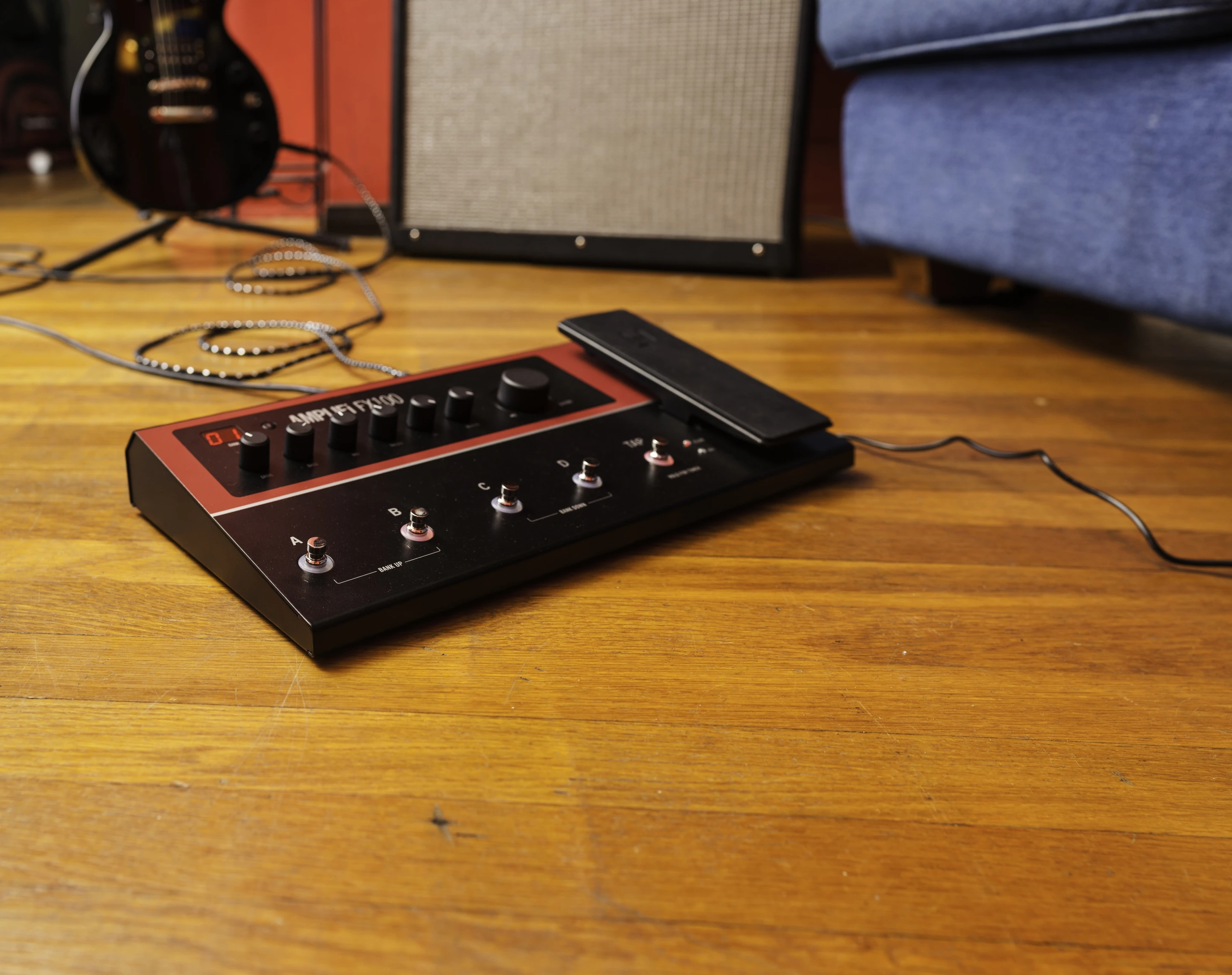 At the same time as routing a guitar signal to amp, the unit can play music from a source device through a home stereo system or external speakers