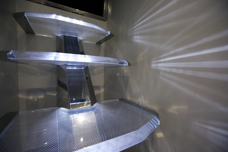Illuminated steps connect upper and lower decks