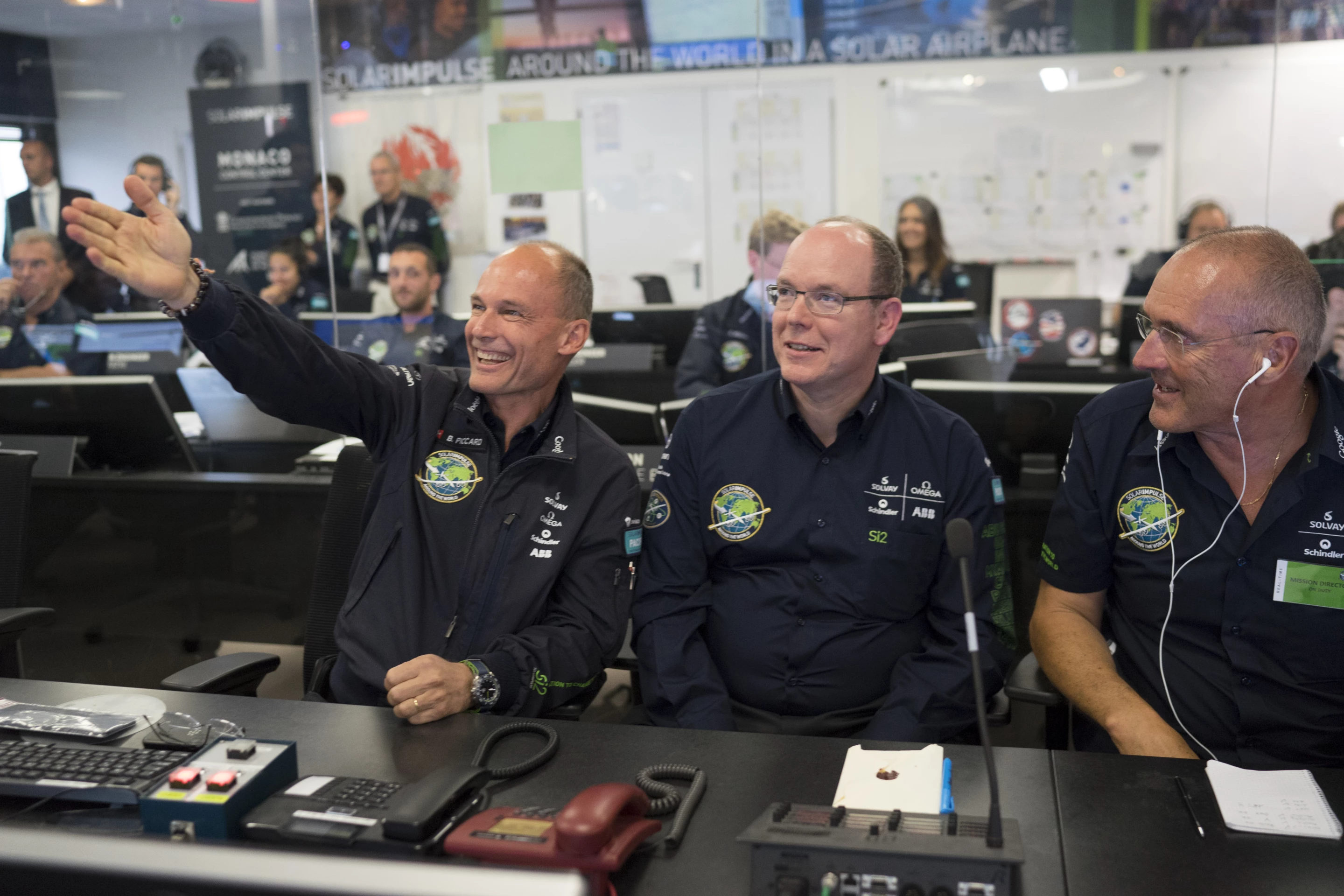 Bertrand Piccard, Prince Albert II of Monaco, and Mission Director Raymond Clerc just before take-off at the Monaco Mission Control Center