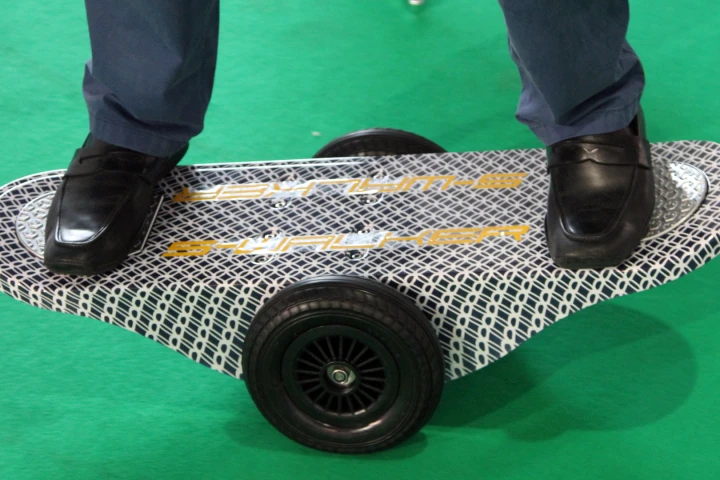 The S-Walker Board combines aspects of a Segway, a balance board and a skateboard
