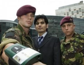 Amin Ismail and the device, with Captain Ollie Jedrej and Lance Corporal Dave Walker, from the 4th Battalion: Parachute Regiment.