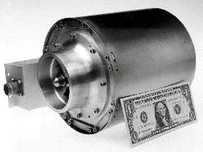The new TDI engine (alongside a dollar bill for perspective) packs a big punch for its size