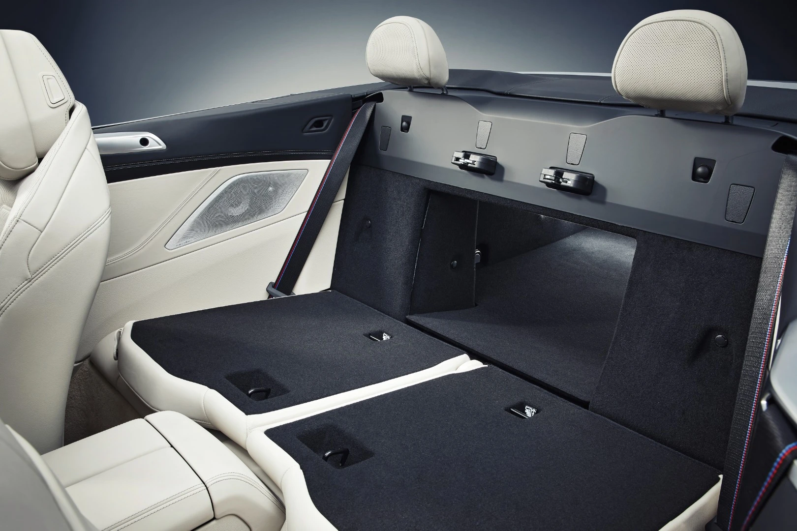 Rear pass-through for extra storage versatility