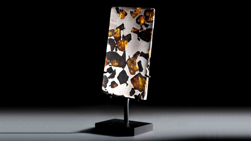 Gemstones from outer space | Price: $6,348 (£5,000) | Auction Link | From the Fukang, in the Xinjiang Uyghur Autonomous Region (the home of the best known meteorite in history), this partial slice of a meteorite features a mosaic of sparkling olivine and peridot in a gleaming iron-nickel matrix, which has been polished to a mirror finish on both sides.