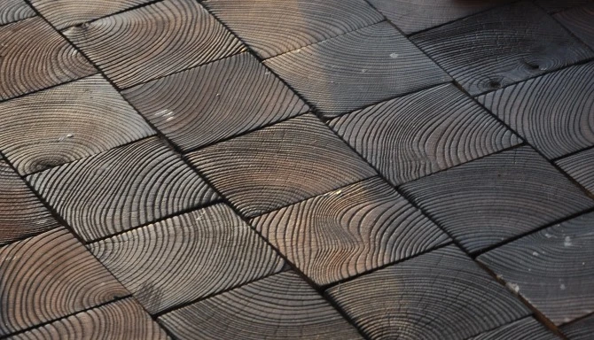The home features intricate wooden flooring and curved surfaces
