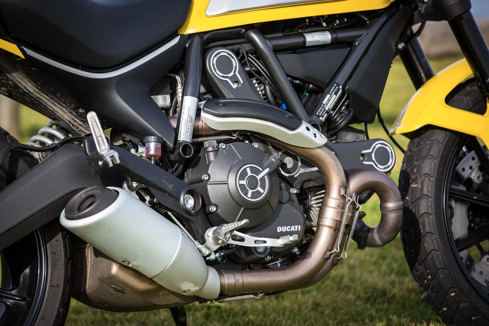 2015 Ducati Scrambler – standard exhaust and catalyser box are first to touch down