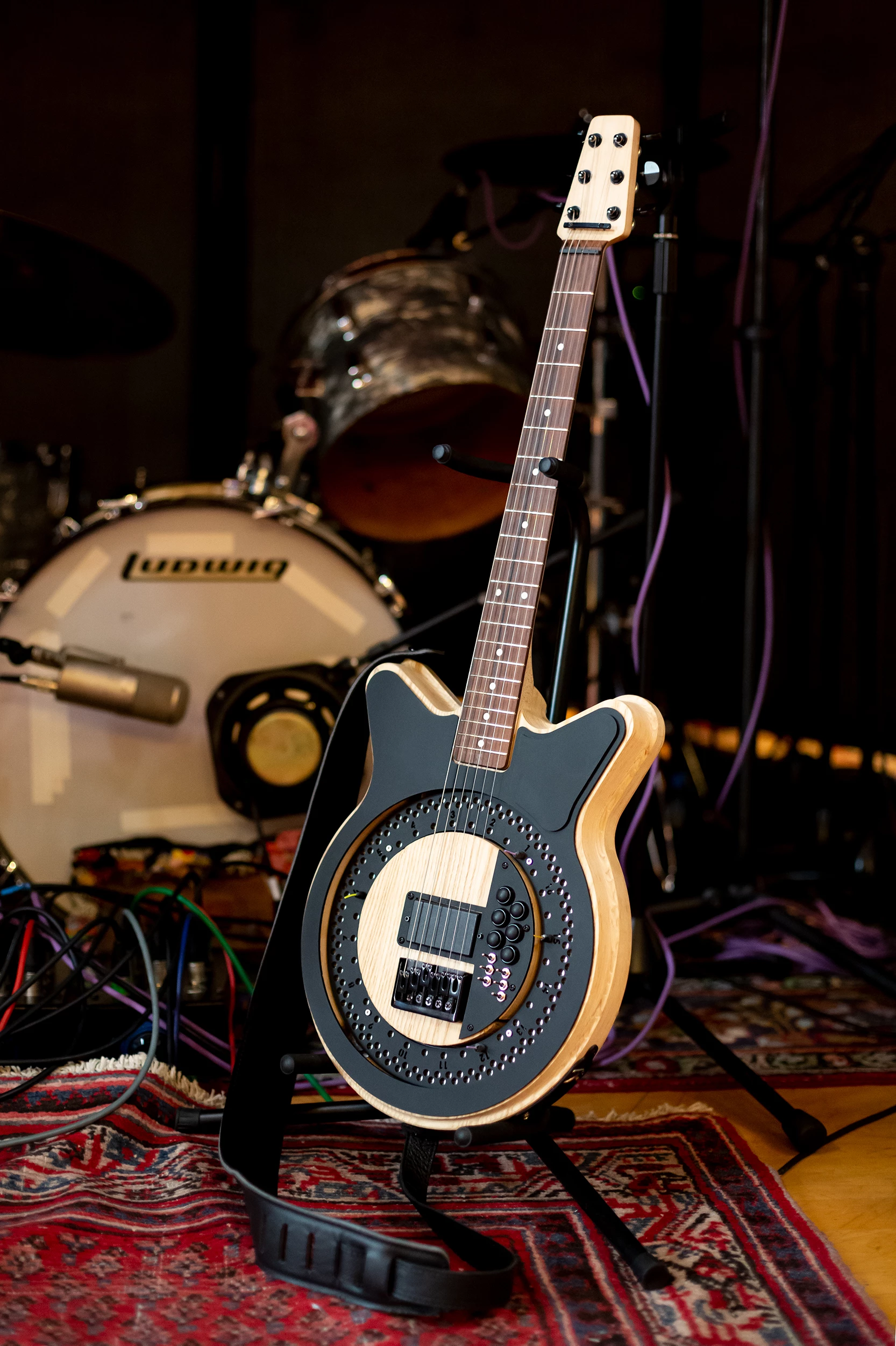 The Circle Guitar's spinning disc unit is, "in essence, a mechanical step sequencer that rotates up to 250 beats-per-minute beneath the strings"