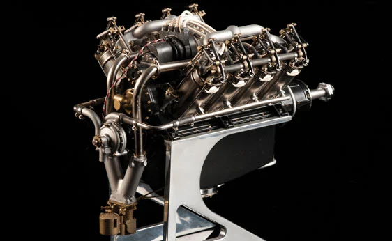 Curtiss OX-5 engine model. A famous pre-war aircraft engine in miniature. Legendary aviator Glenn Curtis used an aircooled version mounted in a motorcycle to set a land speed record. Highly detailed and accurate construction, including chassis plate, wiring, magneto, valves etc. Expected to go for US$3,000 - 4,500