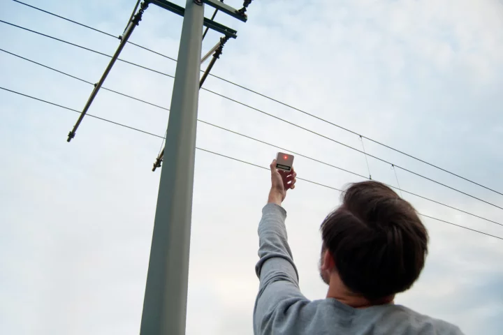 The handheld Electromagnetic Harvester allegedly charges a AA battery using just the electromagnetic fields given off by gadgets, power lines, vehicles, and even living things