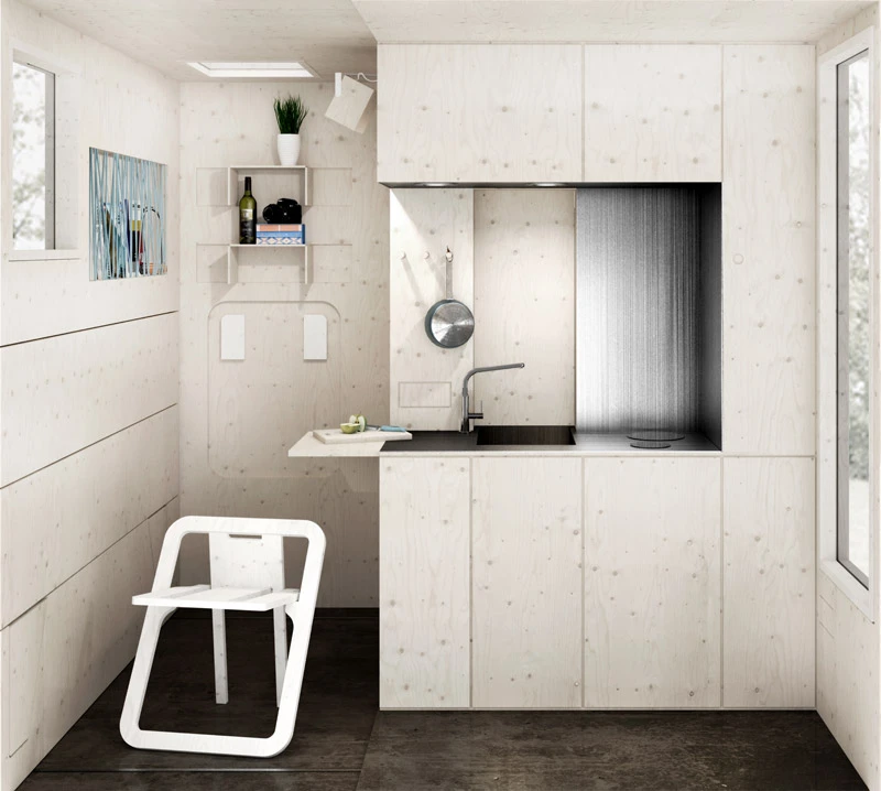There's also a kitchenette, a pull-out countertop table, and a couch that turns into a bed