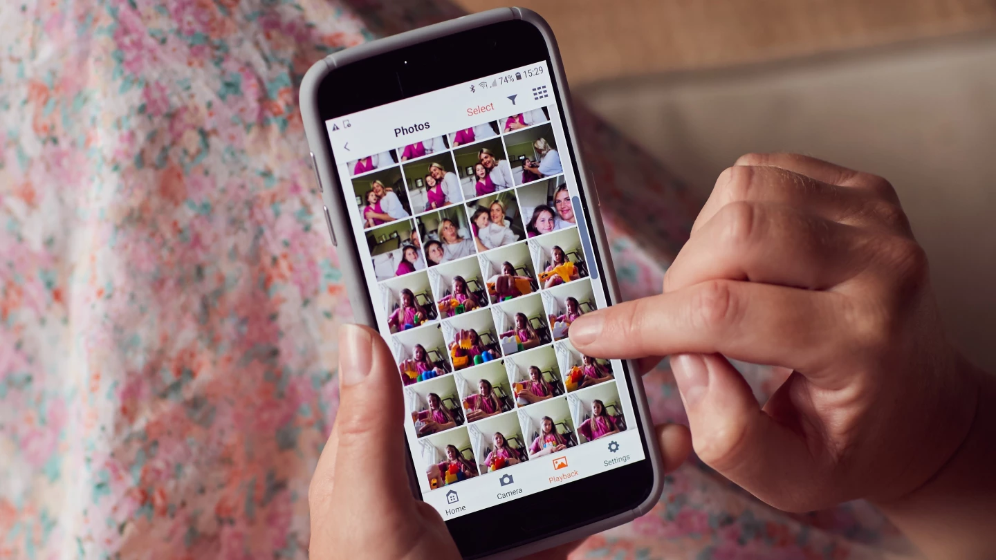 Captured stills and videos are sent to a companion mobile app for selection, and upload to social media