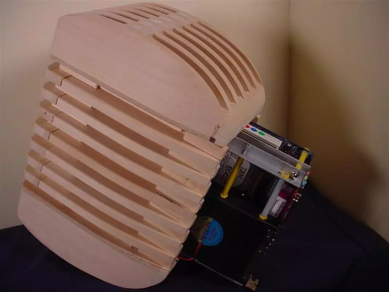 The computer's board, drive and fan just slide into the outer shell