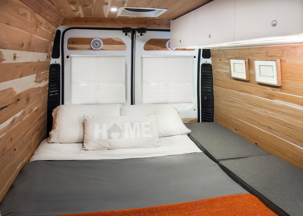It looks a touch bumpy, but if you have the bench cushions, you essentially have a wider bed to sleep on
