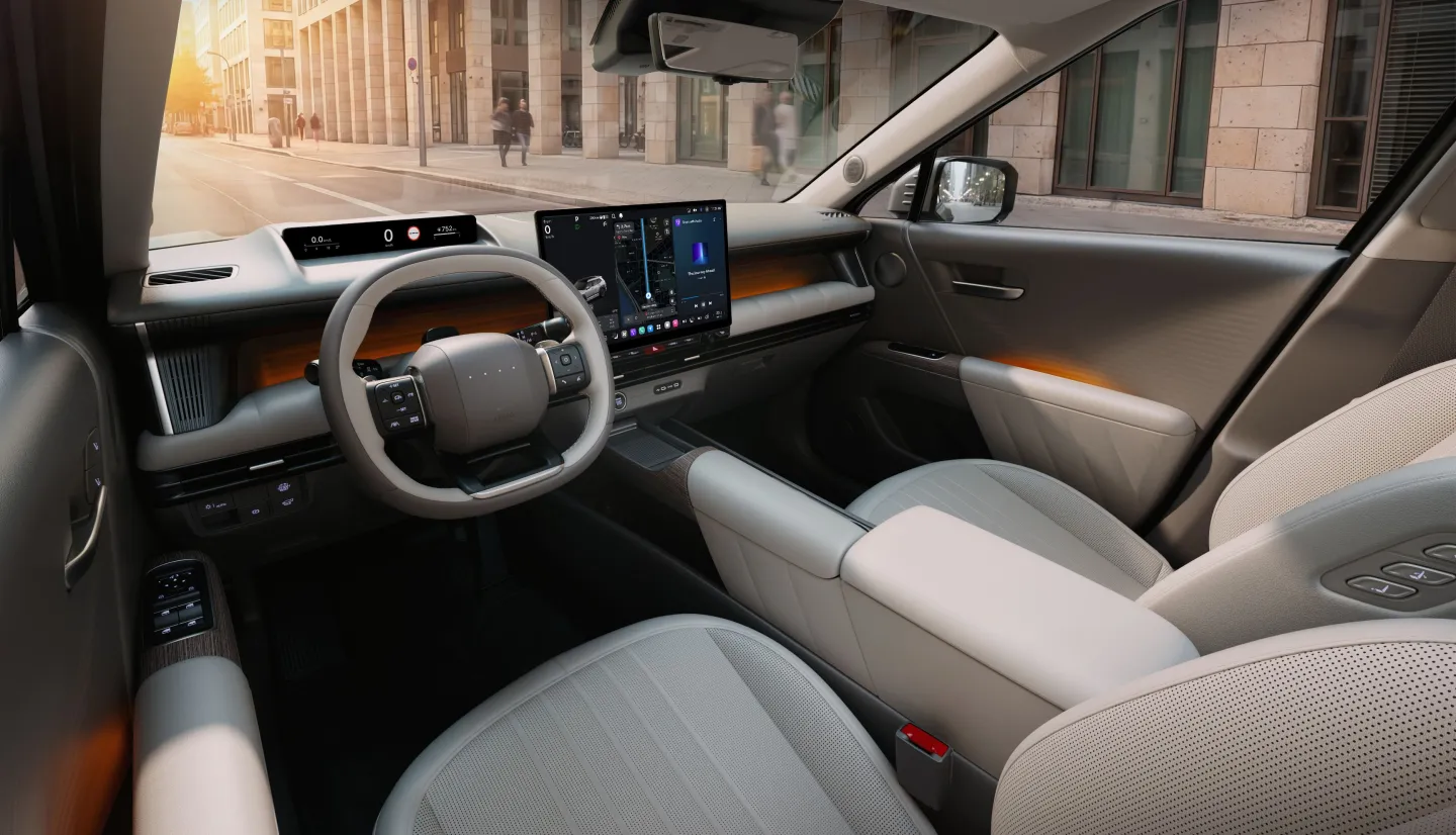 Its dashboard combines panoramic digital displays with physical controls