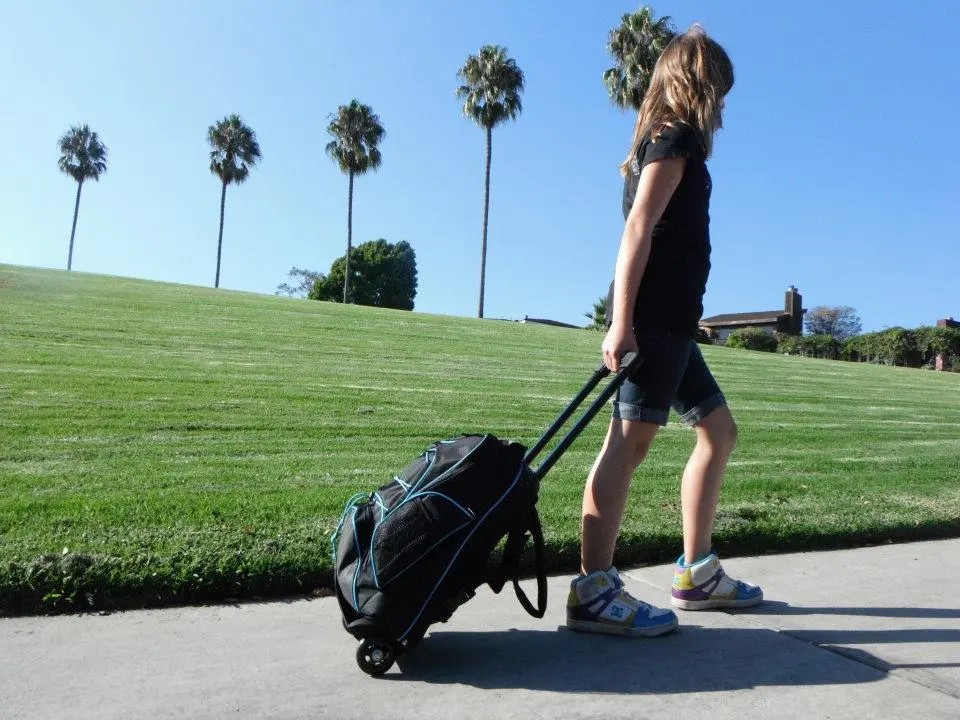 The Fly, in "wheeled luggage" mode