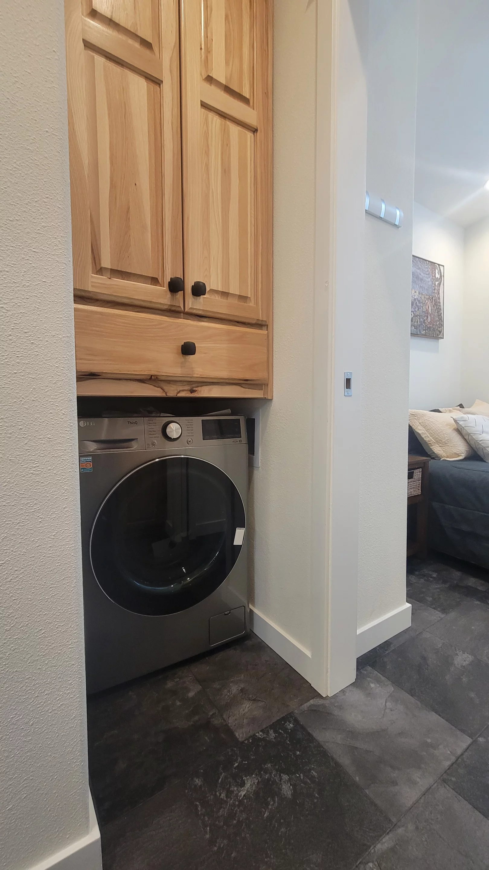 The Olivia Summit's kitchen includes a washer/dryer and quite a lot of storage space