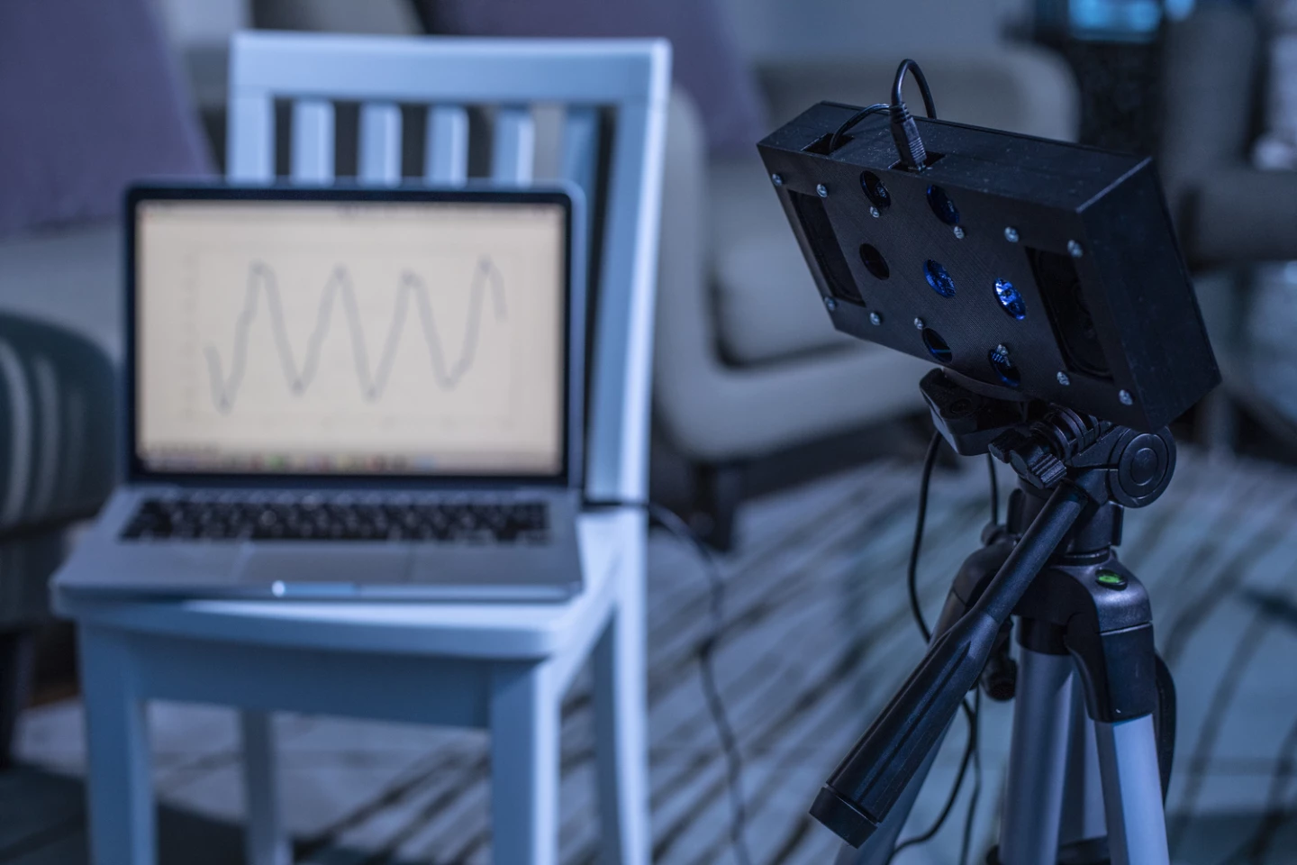 The device plays white noise and records how the noise is reflected back to detect breathing motions of infants' tiny chests.