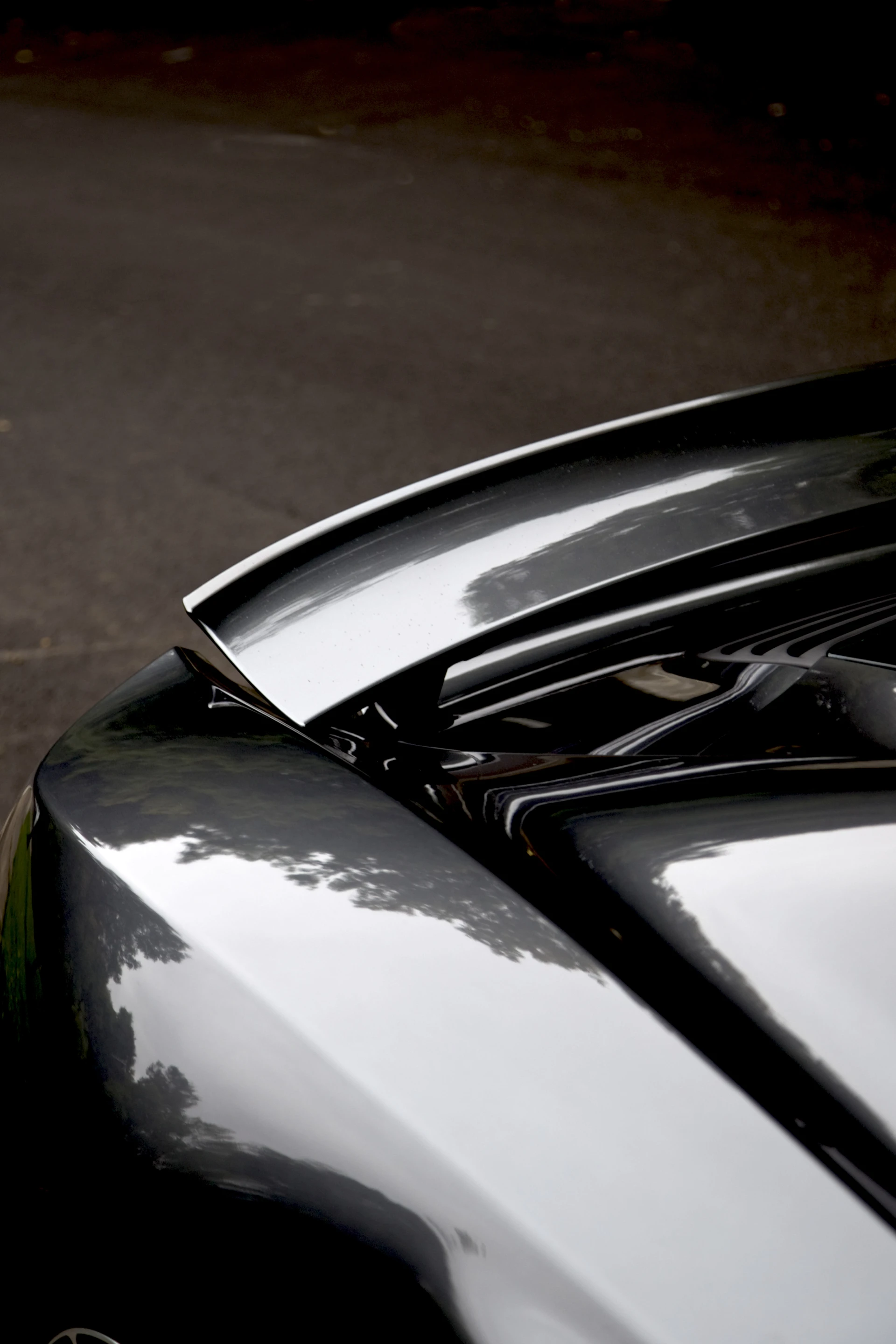 Borrowed from Formula 1, the 12C's rear spoiler pops up to near vertical under heavy braking (Photo: Angus MacKenzie/gizmag.com)