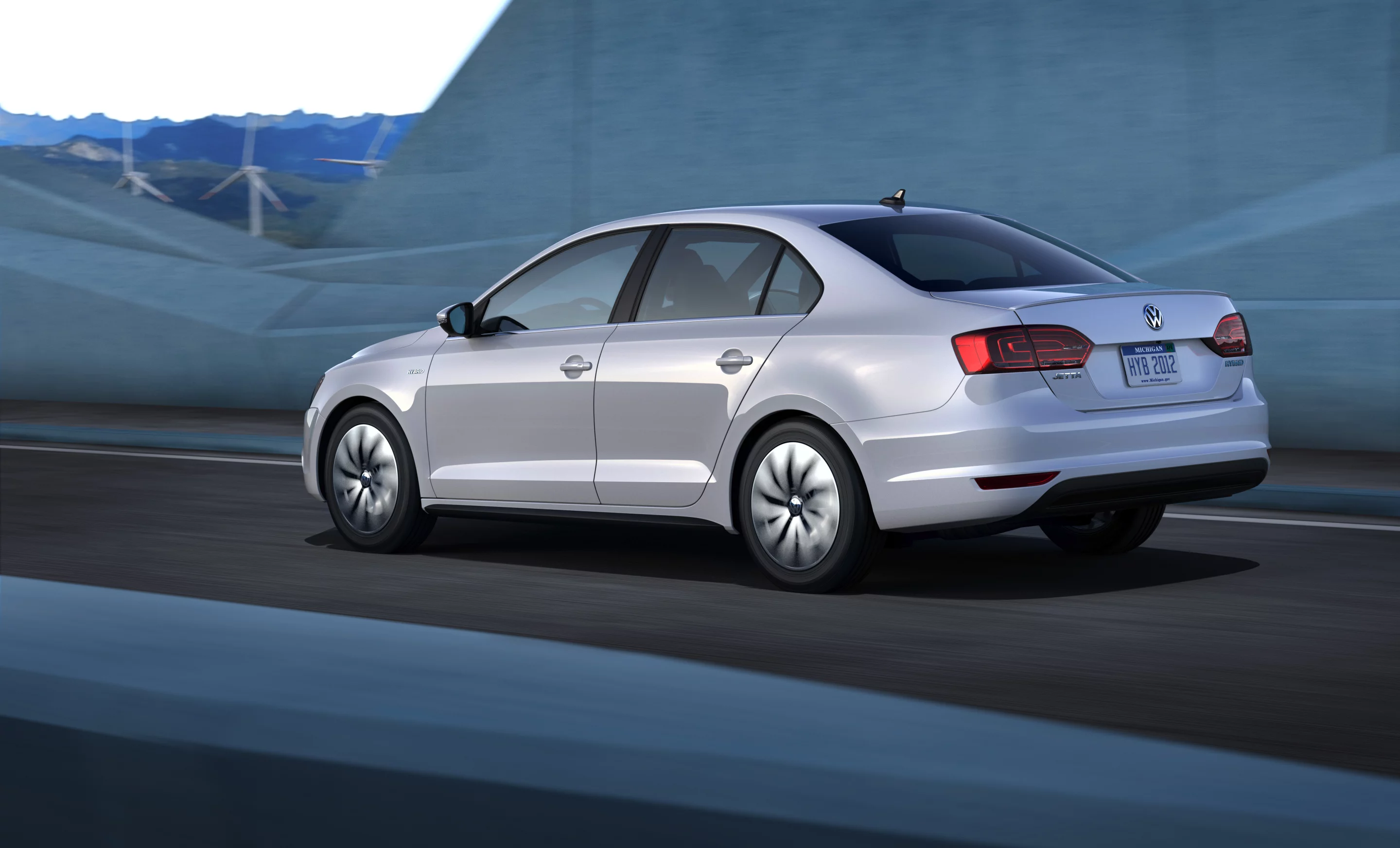 When Jetta's driver releases the gas pedal to apply the brake, the car's decoupling clutch disengages the ICE engine so that all the retardation is done by the brakes rather than a combination of brakes, drivetrain drag and engine torque - which is claimed to release more energy back to the battery through regenerative braking