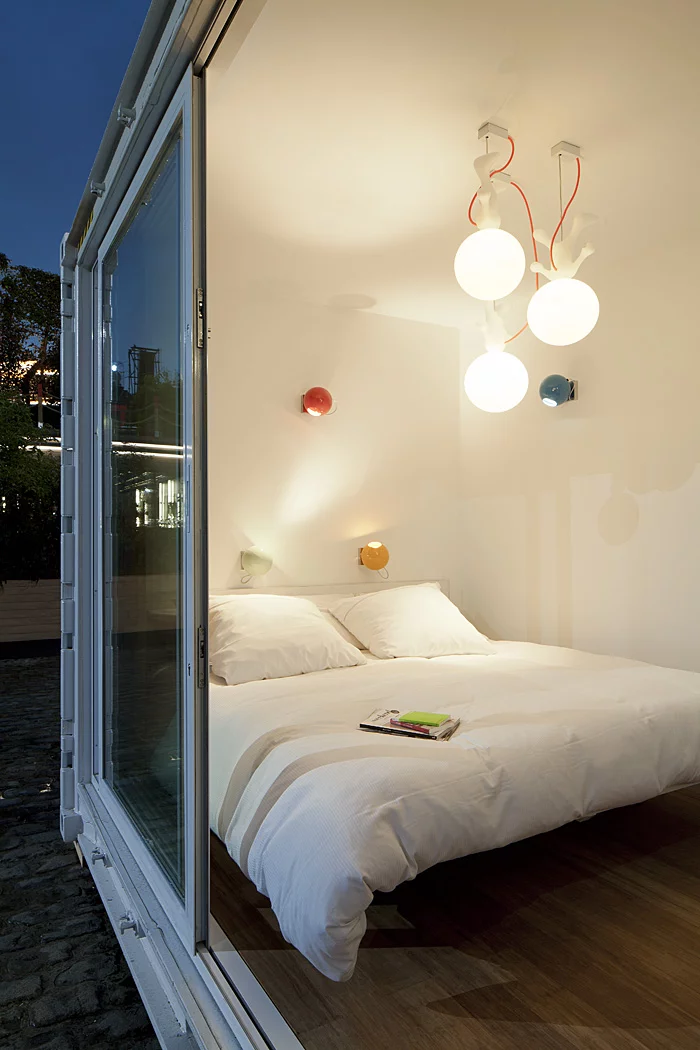 Sleeping Around is a portable hotel comprised of shipping containers that's small enough to be placed in almost any location within a few hours