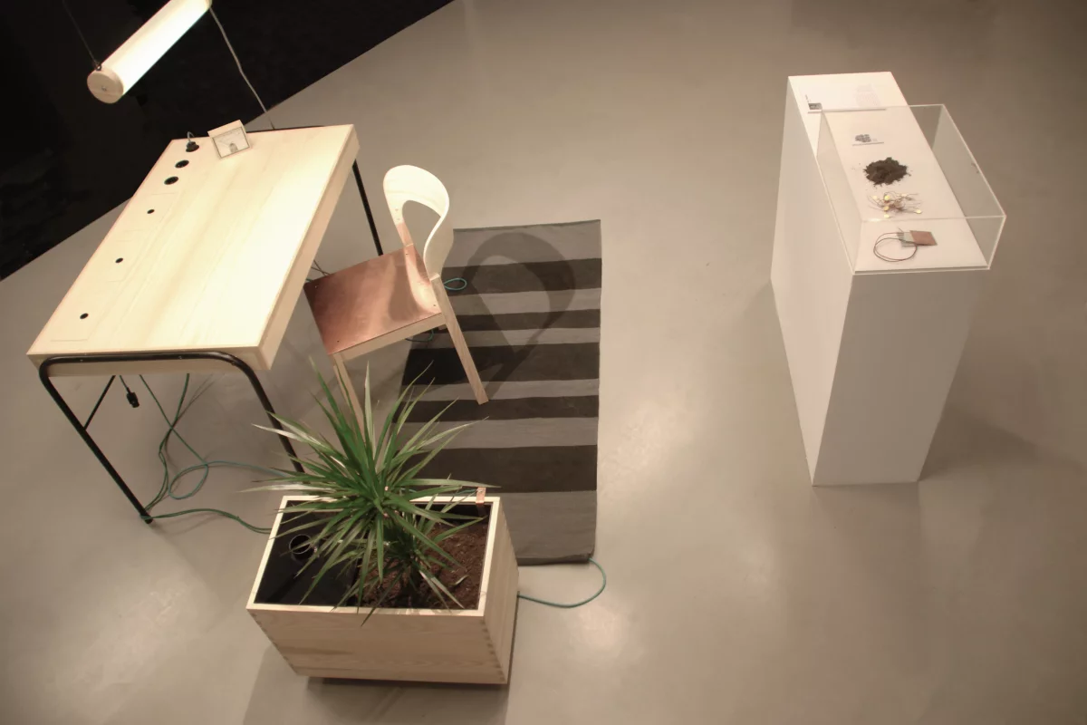 Unplugged is a prototype of an office work station that powers devices via energy that is collected off the human body