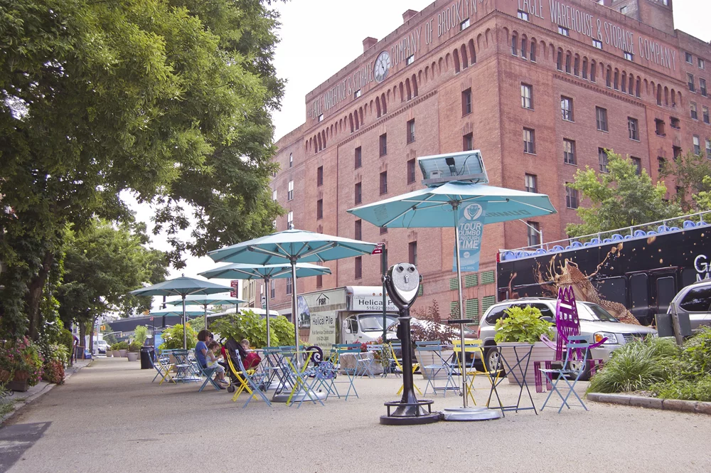 The cafe umbrella has its own battery pack that's charged via PV panels up top