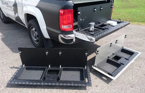 Black Sheep Innovations doesn't make campers, but its modified Amarok tailgate can hold a camp kitchen in place