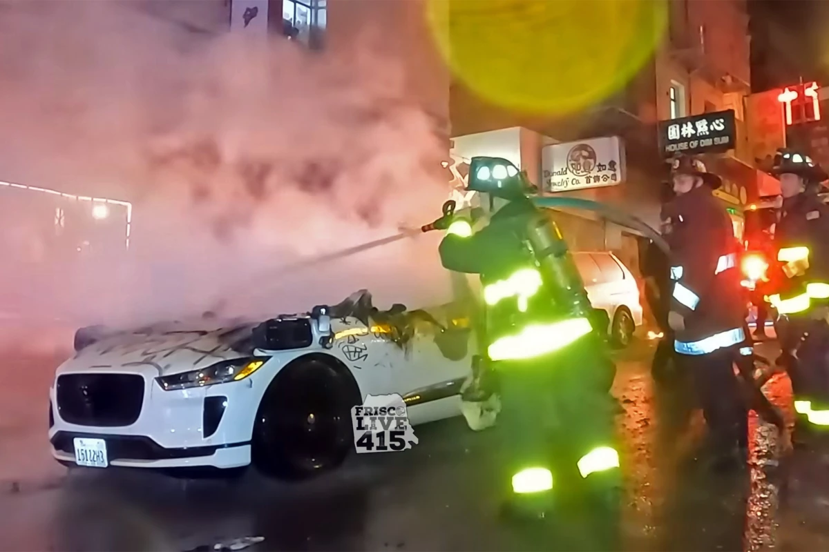 Screen shot from a video captured by Frisco Live 415, a Waymo AV had been vandalized and torched on Feb 11th, 2024