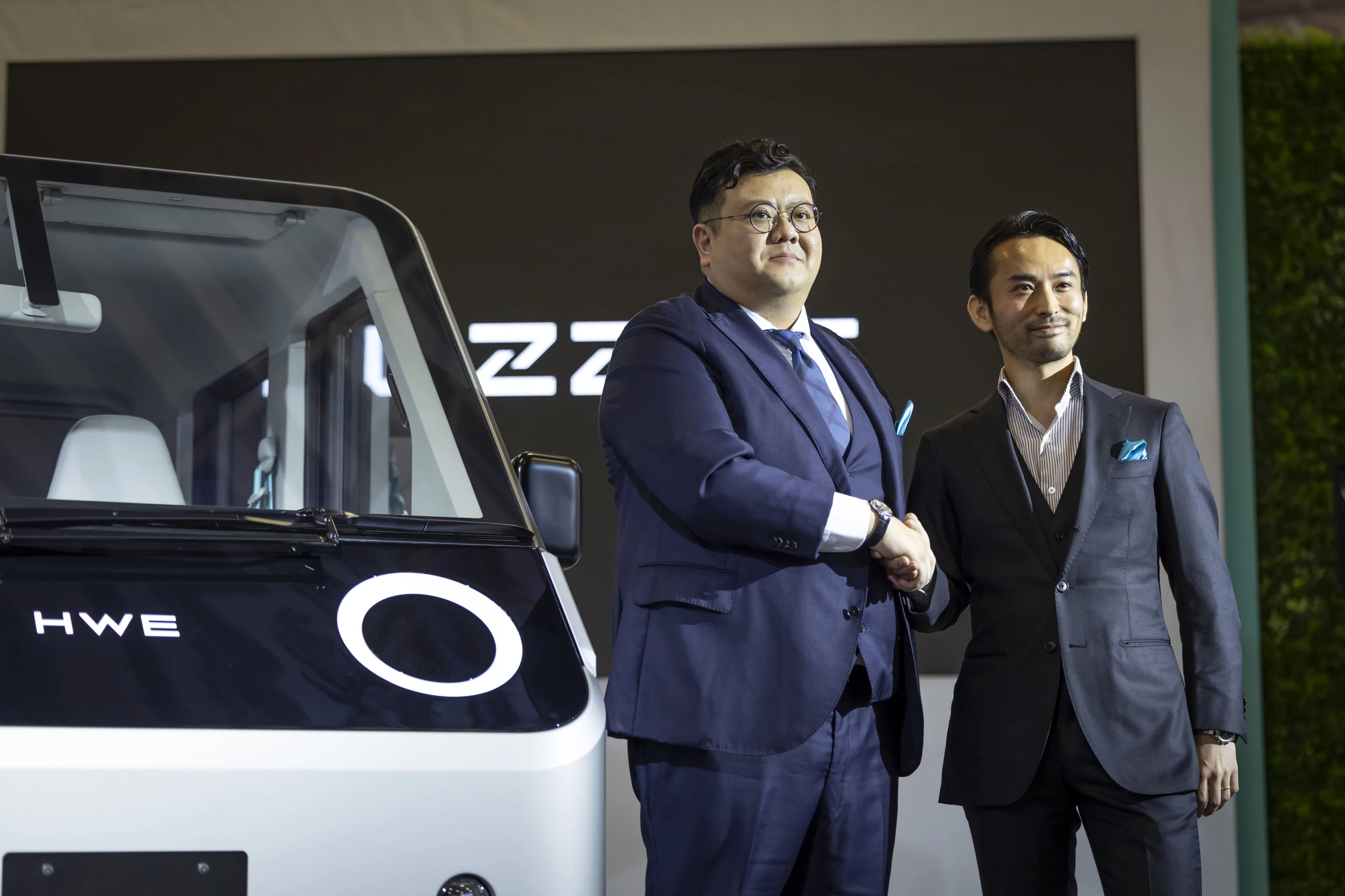 HW Electro's president Weicheng Xiao (left) with the Puzzle's designer Ryuhei Ishimaru (right)